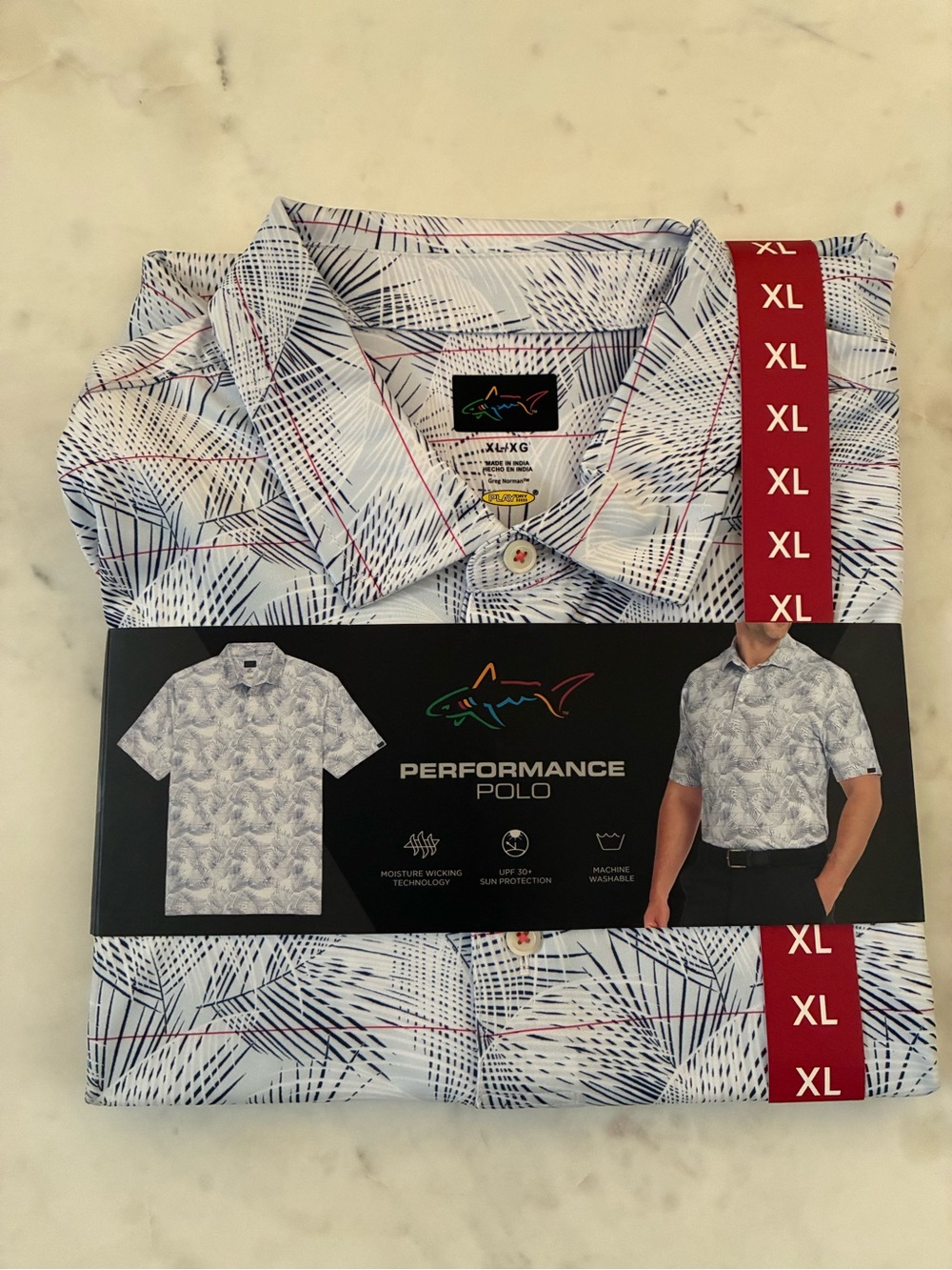Greg Norman Collection Performance Polo - White with Navy & Red Palm-Print